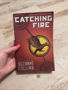 Scholastic Catching Fire Paperback - Red and Yellow Cover